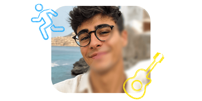A person smiling near the coast with activity doodles.